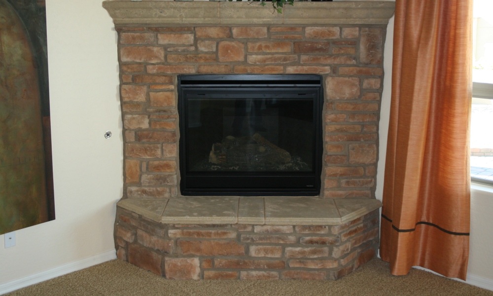 Fireplace | Precast Panels of Hearth and Mantle Contrasting with Brick