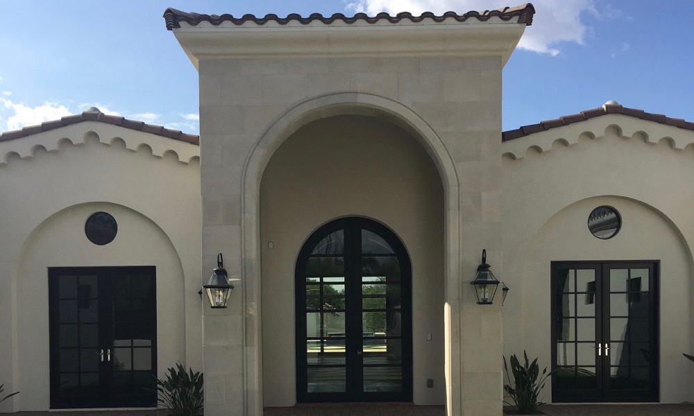 Matching Stone Panels on Front Face of Elevation, and also Surrounding Entry Way Trim