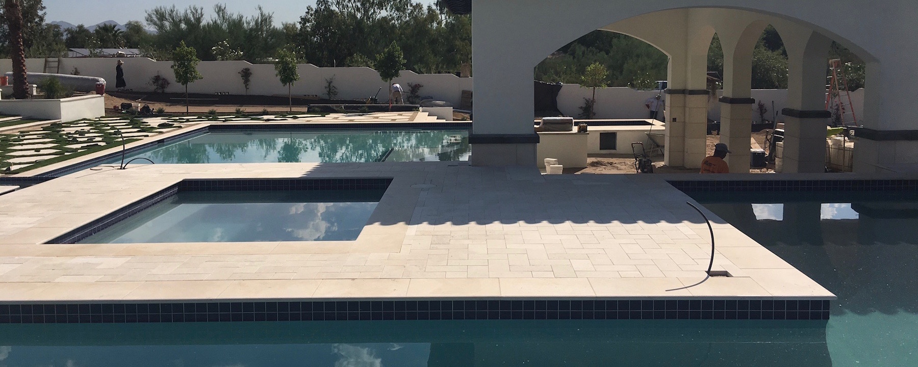 Pavers, Pool Coping, Custom Dark Color Design Accent on Columns, Wall Coping