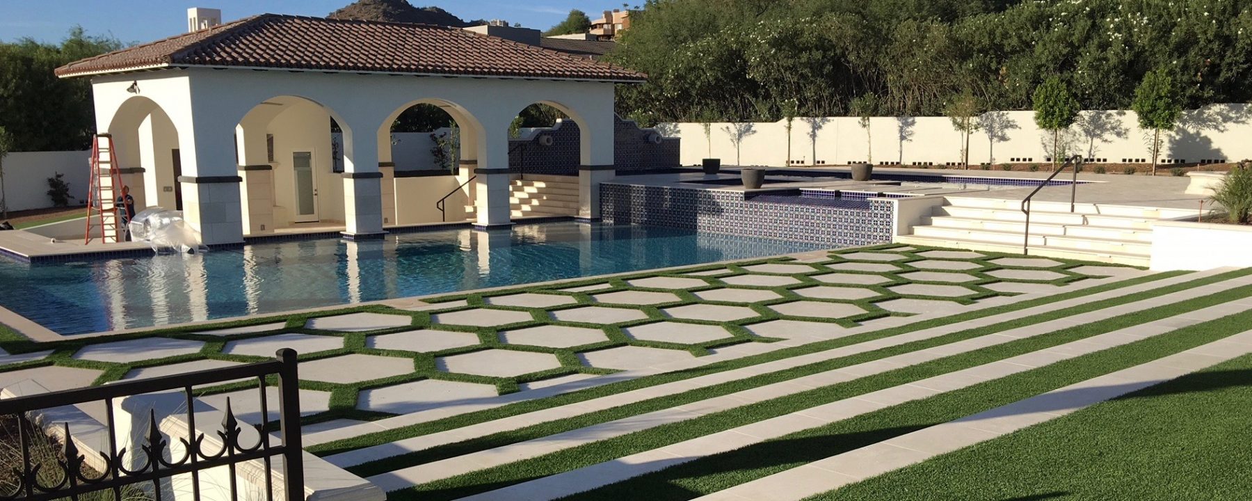 Pavers, Pool Coping, Custom Dark Color Design Accent using Manufactured Stone Panels